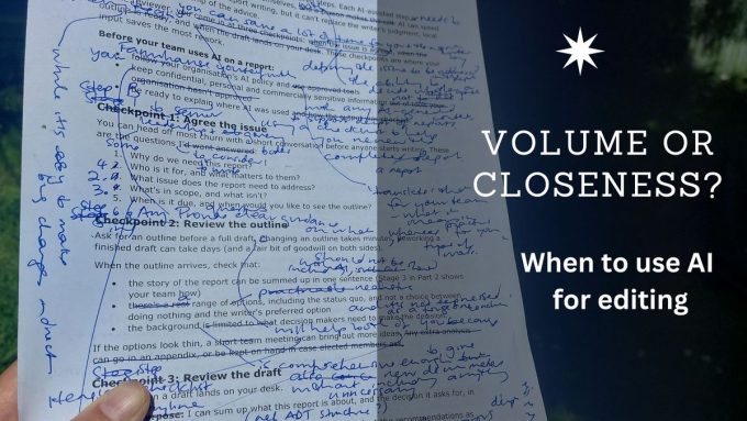 A hand holding a printed draft covered in handwritten blue-pen edits, with the words ‘Volume or closeness? When to use AI for editing’.